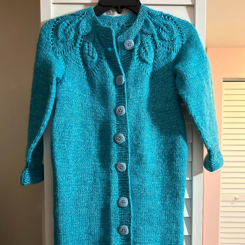 Hand knit knee length jacket